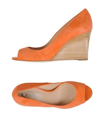 Shop Tod's Pumps In Coral