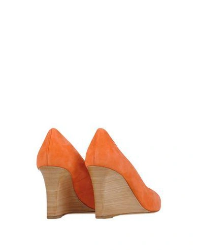 Shop Tod's Pumps In Coral