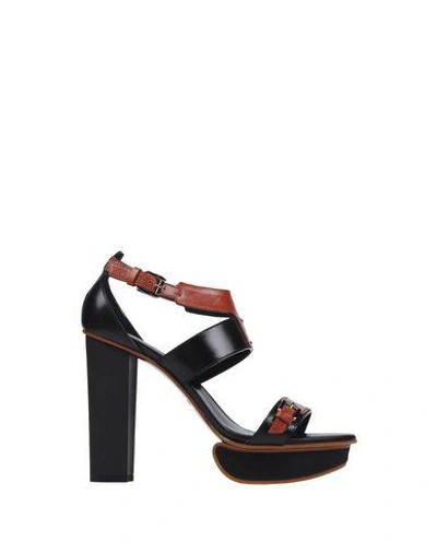 Shop Tod's Sandals In Brown