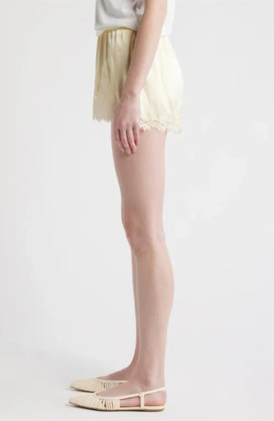 Doen Iona Lace-trimmed Silk-satin Shorts In Yellow