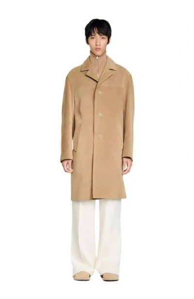 Sandro Long Belted Leather Coat In Brown