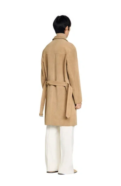 Sandro Long Belted Leather Coat In Brown