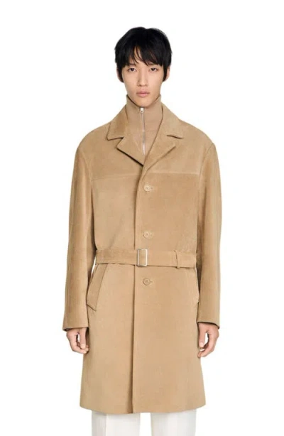 Sandro Long Belted Leather Coat In Brown