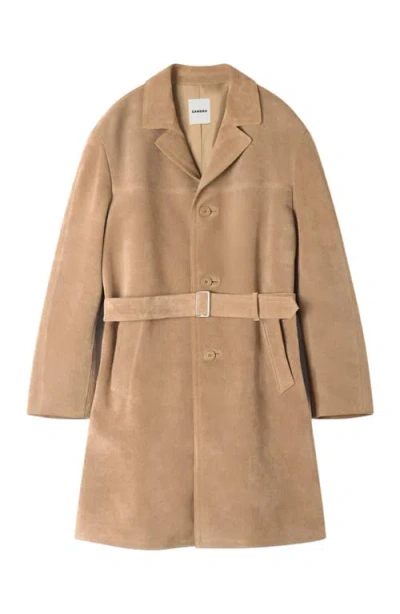 Sandro Long Belted Leather Coat In Brown