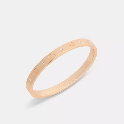 Coach Repeated C Hinged Bangle In Gold