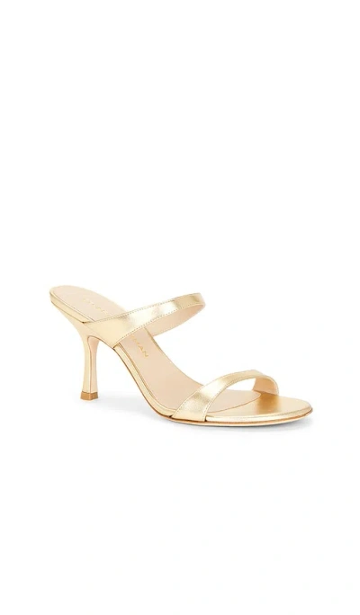 Stuart Weitzman Nudist Metallic Leather Slide Sandals In Gold