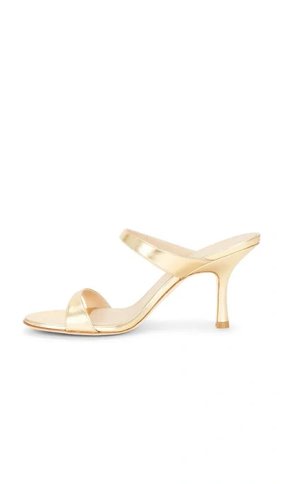 Stuart Weitzman Nudist Metallic Leather Slide Sandals In Gold