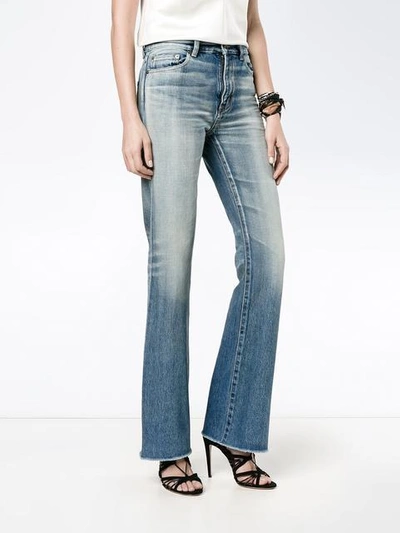 Shop Saint Laurent Jeans Mit Ausgestelltem Bein In Blue