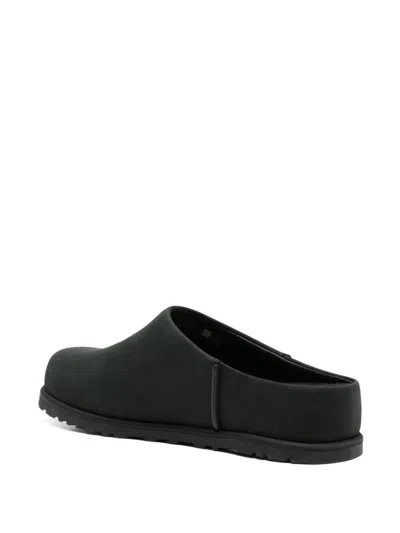Ugg Otzo Smooth Leather Backless Loafers In Black