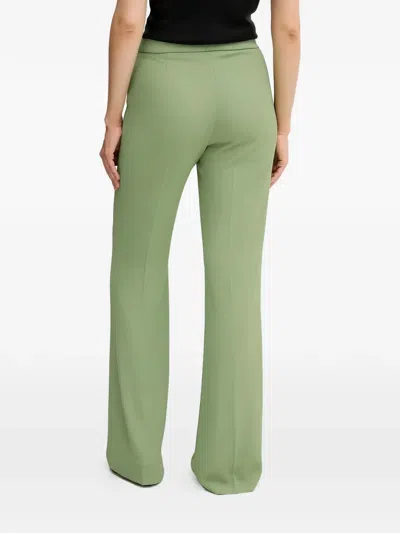 Sandro Ferrone Flared Trousers In Green