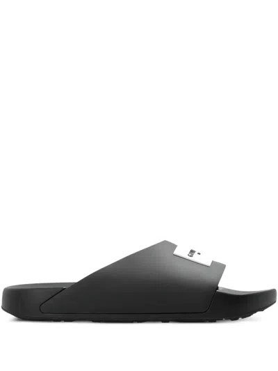 Givenchy Label Flat Mules In Black Rubber In Blue