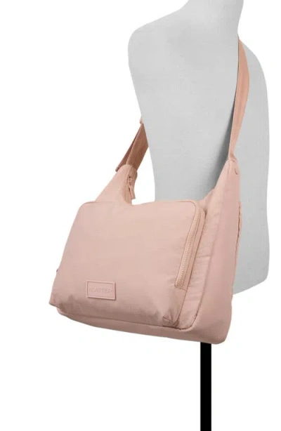 Hunter Commute Messenger Bag In Pink