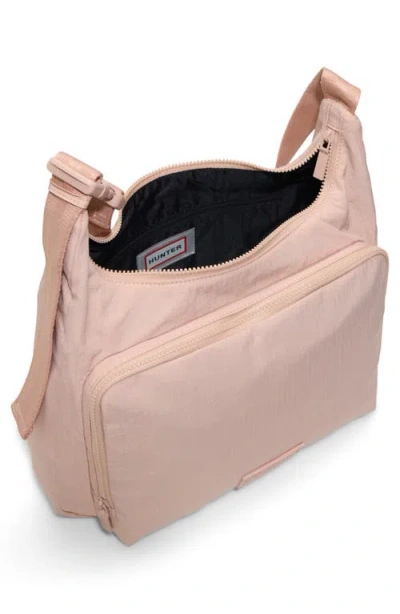 Hunter Commute Messenger Bag In Pink