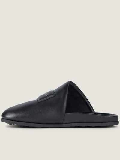 Givenchy Leather Slippers Featuring Flat Sole Design In Black