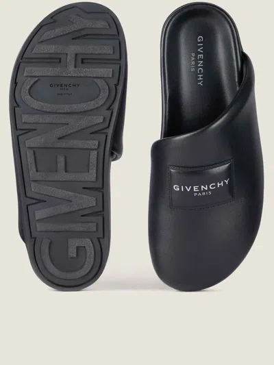 Givenchy Leather Slippers Featuring Flat Sole Design In Black