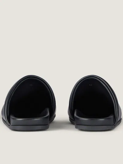 Givenchy Leather Slippers Featuring Flat Sole Design In Black