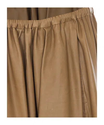 Auralee Elasticated Leather Skirt In Neutral