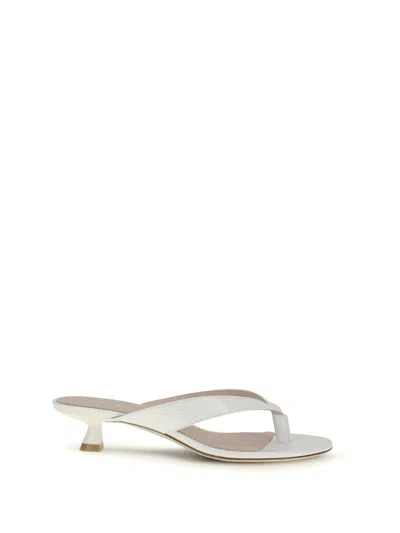 Stuart Weitzman 35mm Rio Sleek Patent Leather Thong Sandals In White