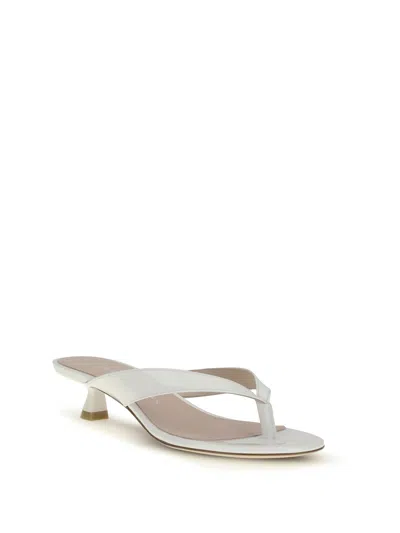 Stuart Weitzman 35mm Rio Sleek Patent Leather Thong Sandals In White