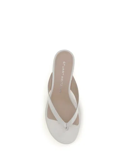Stuart Weitzman 35mm Rio Sleek Patent Leather Thong Sandals In White