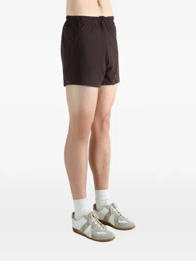 Satisfy Perforated Drawstring Shorts In Black