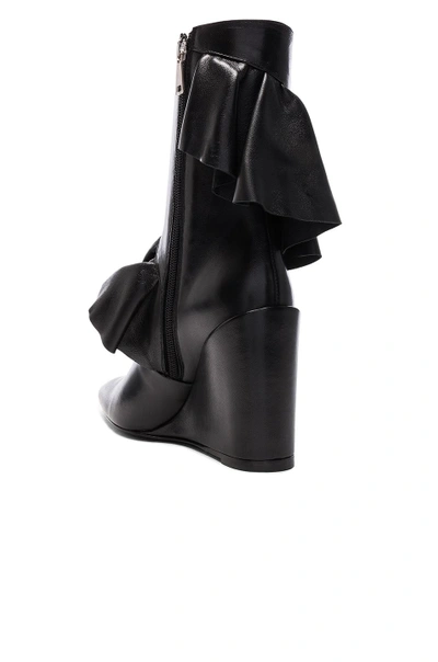 Shop Jw Anderson Mid Calf Leather Ruffle Boots In Black