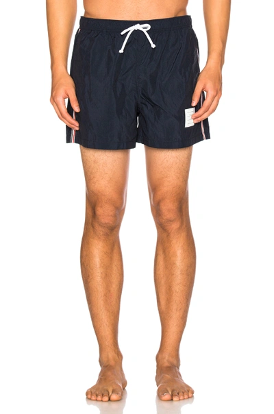 Shop Thom Browne Classic Swim Trunks In Navy