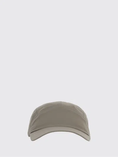 And Wander Pertex Shield Rain Cap In Purple