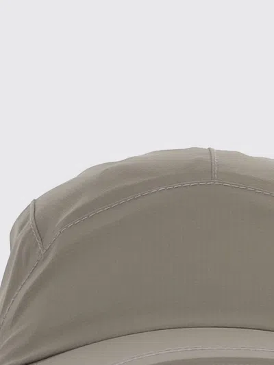 And Wander Pertex Shield Rain Cap In Purple