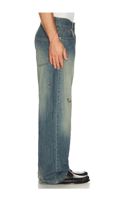 We11 Done Piercing Denim Jeans In Blue