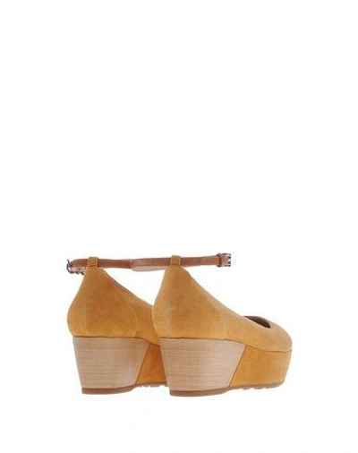 Shop Tod's Pump In Camel