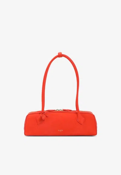 Alaïa Le Teckel Medium Nubuck Shoulder Bag In Orange