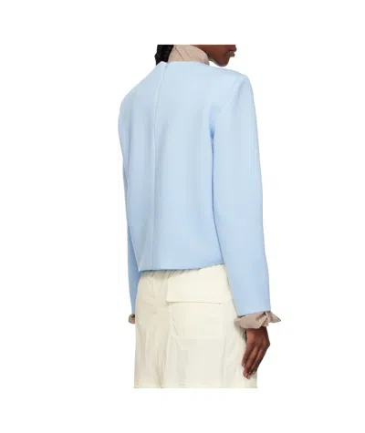 Pushbutton Curvy Shoulder Top In Blue