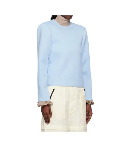 Pushbutton Curvy Shoulder Top In Blue