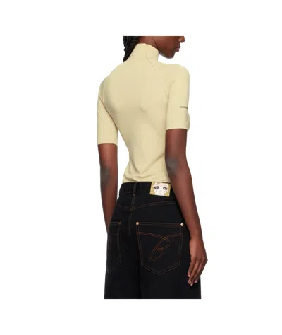 Pushbutton Security Pocket Turtleneck Top In Neutral