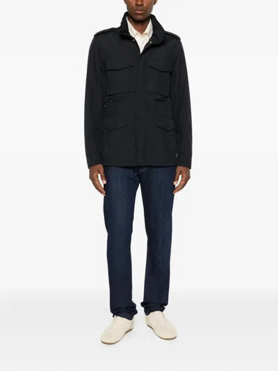 Corneliani Logo-embroidered Jeans In Blue