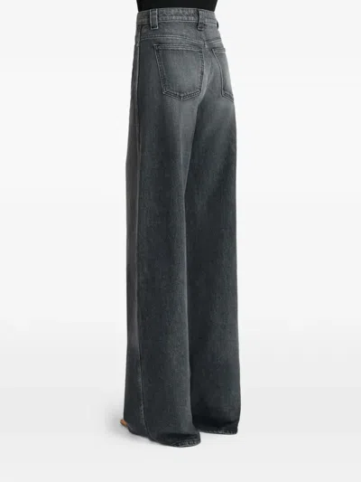 Khaite Dane Mid-rise Stretch Denim Wide-leg Jeans In Gray