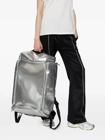 Diesel Logo-print Metallic-effect Backpack In Silver