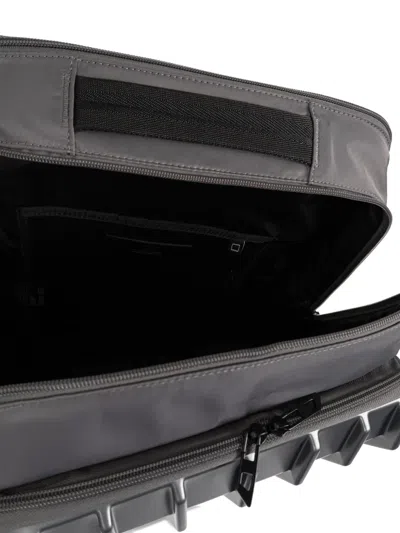 Diesel Embossed Logo Hard-shell Backpack In Gray
