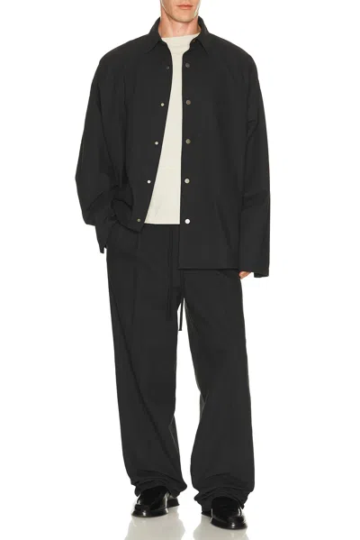 Essentials Logo-embroidered Press-stud Overshirt In Black