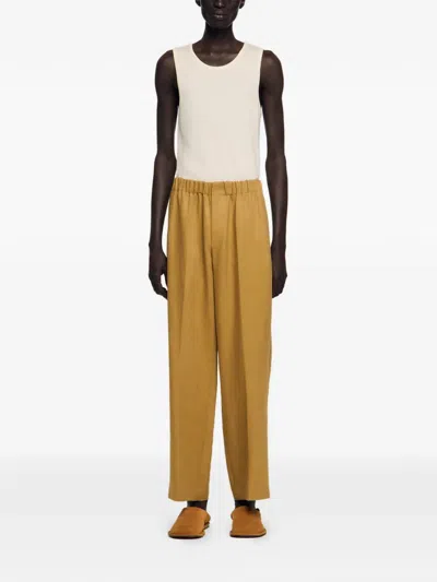 Sandro Elasticated Loose Trousers In Brown