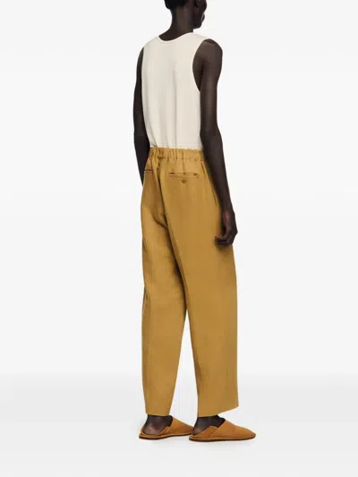 Sandro Elasticated Loose Trousers In Brown