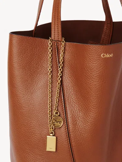 Chloé Spin Ring-detail Shoulder Bag In Brown