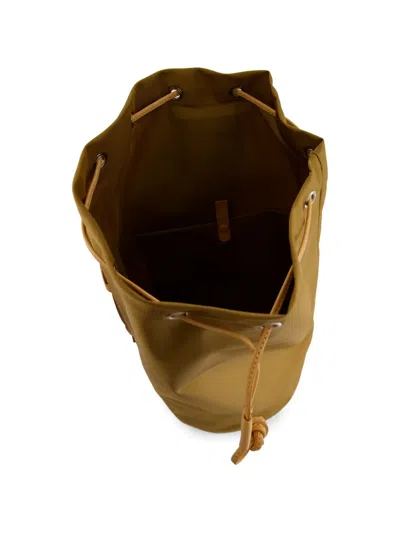 Auralee Aeta Drawstring Backpack In Brown