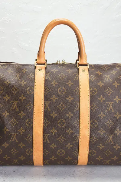 Pre-owned Louis Vuitton Monogram Keepall 45 Handbag In Brown
