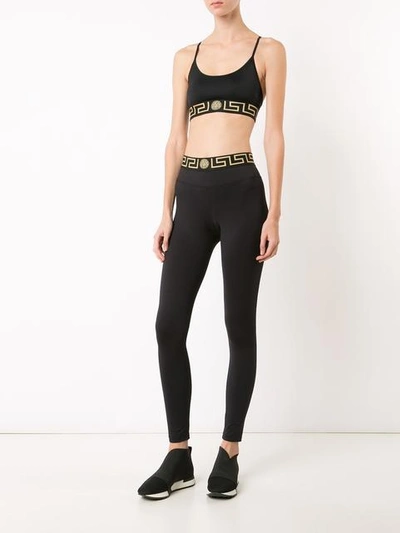 Shop Versace Greek Key Waistband Leggings - Black