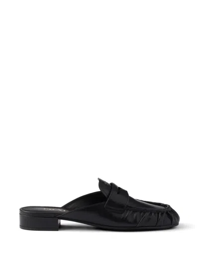 Prada Leather Mules In Black