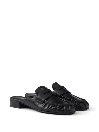 Prada Leather Mules In Black