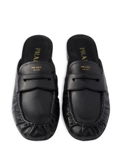 Prada Leather Mules In Black