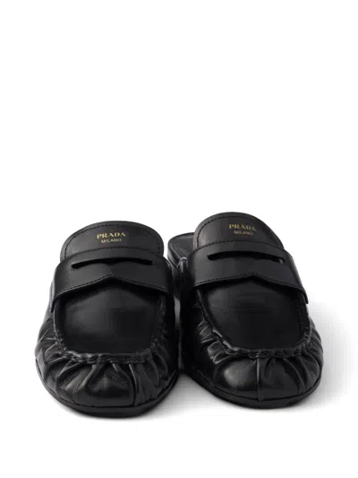 Prada Leather Mules In Black